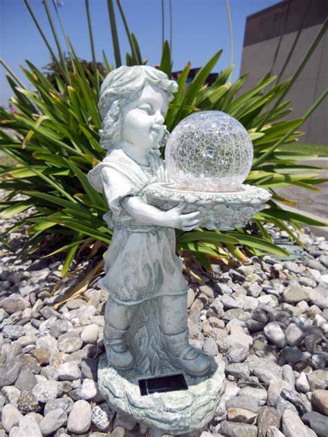 Girl holding Color Changing Crackle Ball Solar Light